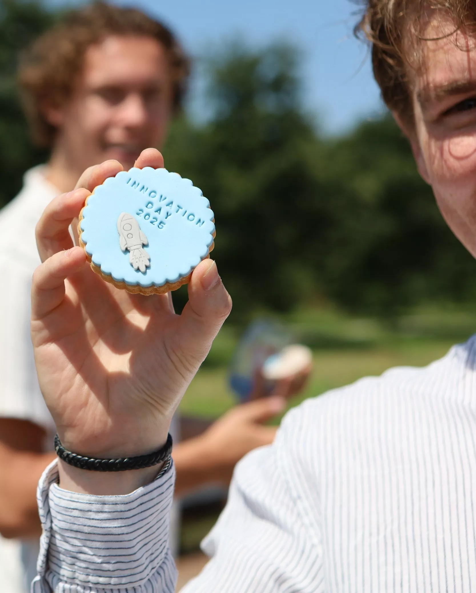 Koen holding cookie with Innovation Day